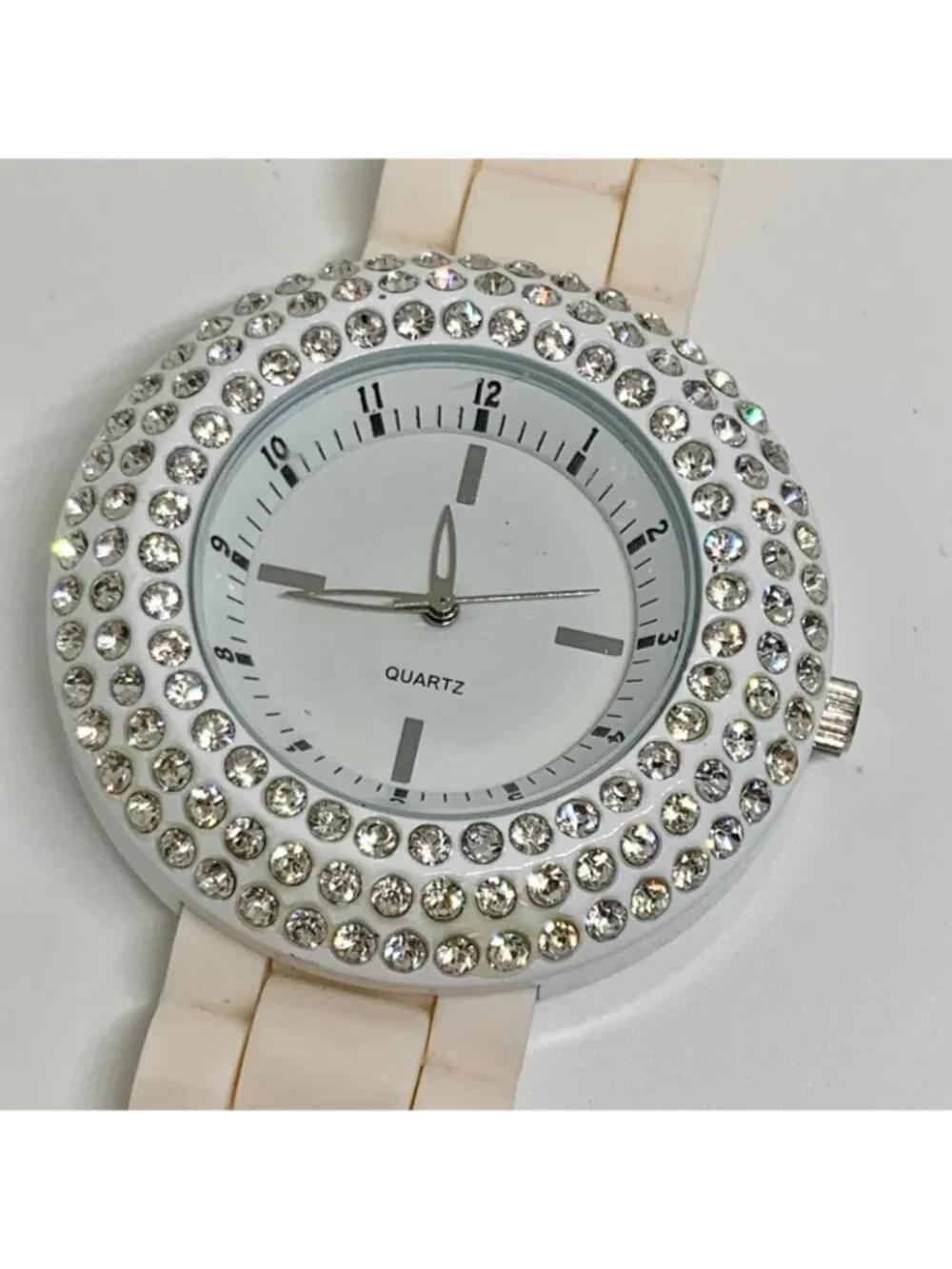 Geneva women’s watch white tone rhinestones 45mm silicone band running